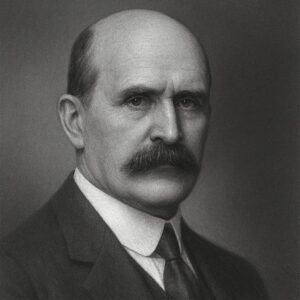 Porträt von William Henry Bragg (1862–1942) im Wegbereiter-Stil in Schwarz-Weiss, mit Schnurrbart, Anzug und neutralem Hintergrund